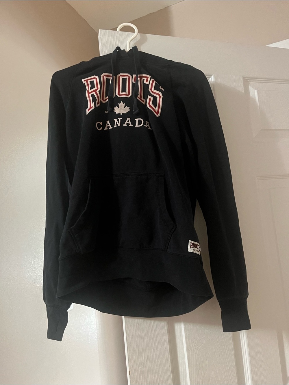 Vintage Women's Size S black hoodie with 'Roots Canada' logo